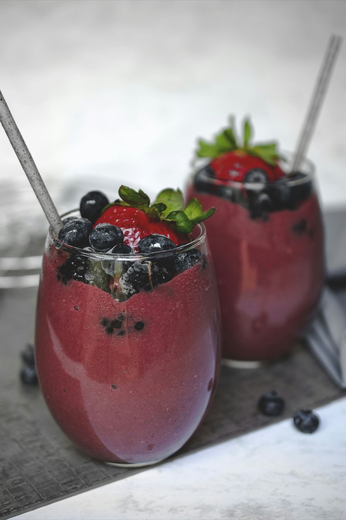 Blended berry smoothies in glasses