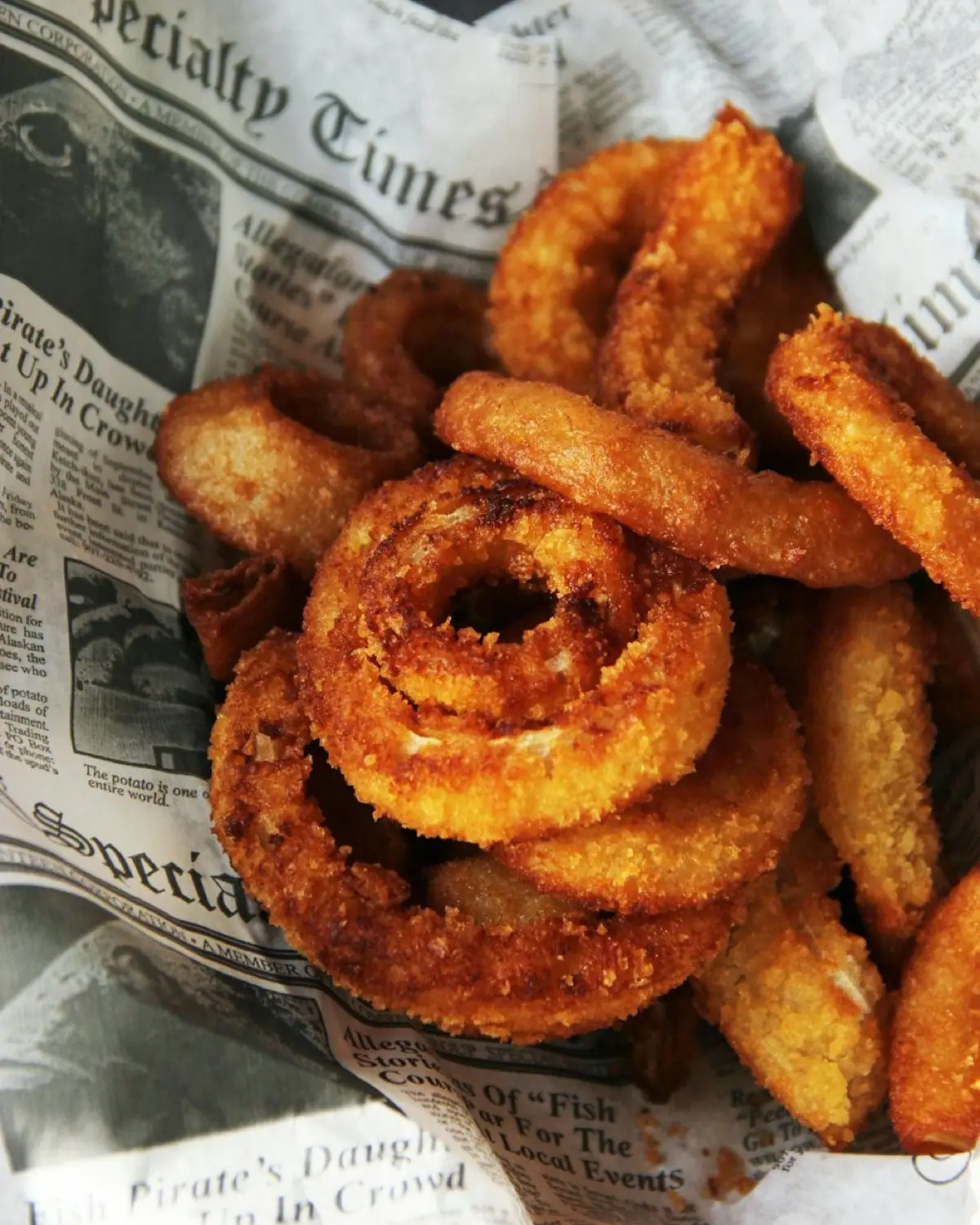 Crispy air-fried onion rings in a basket