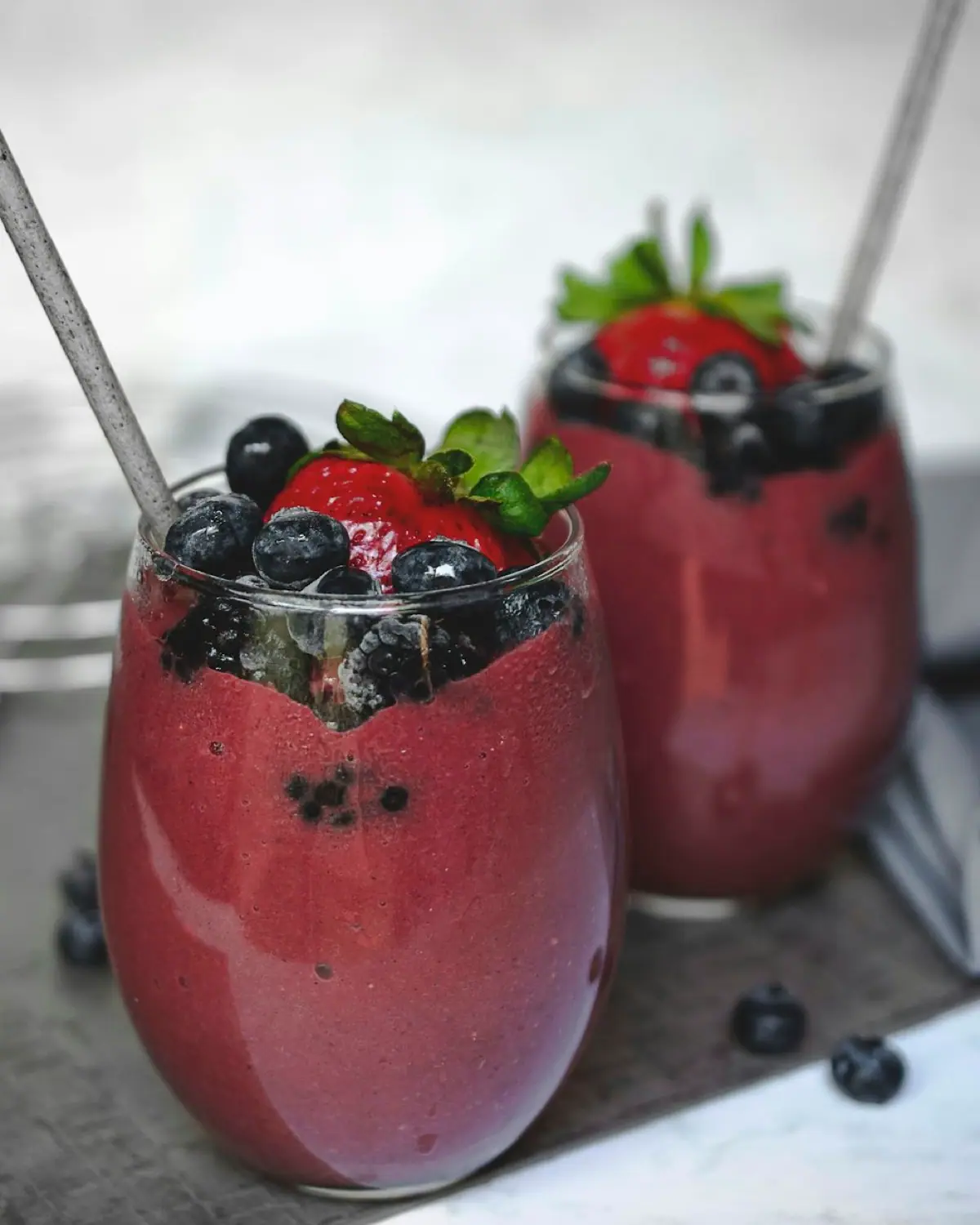 Blended berry smoothies in glasses
