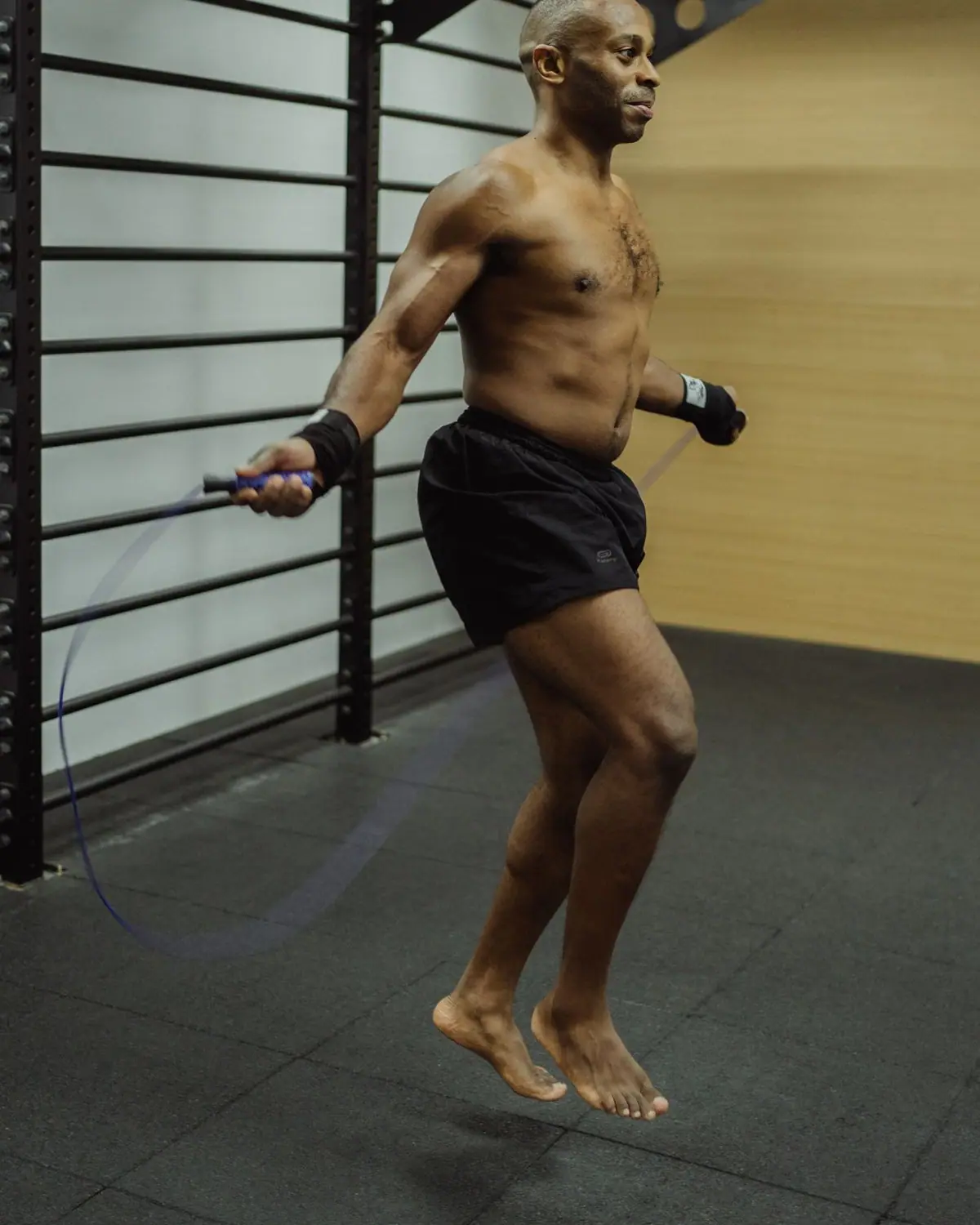 A man doing a jump rope workout