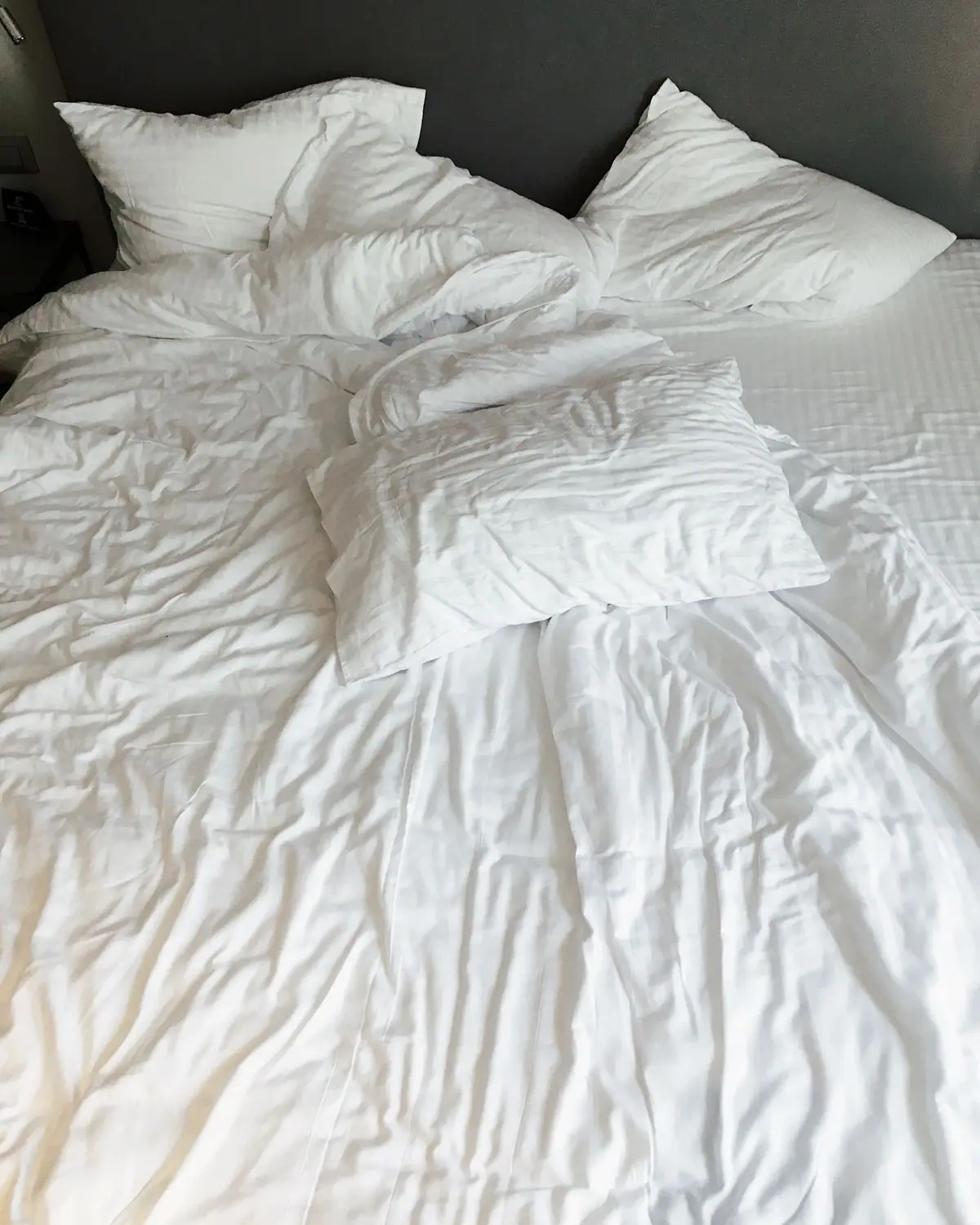 White pillows and bed linen