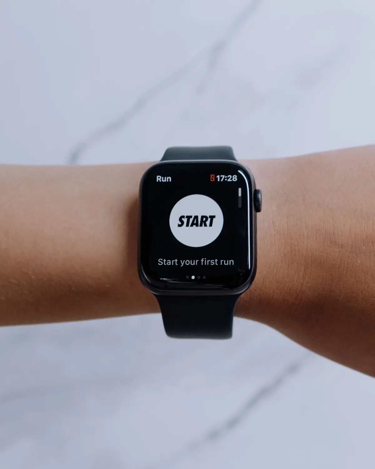 A smartwatch displaying a fitness app