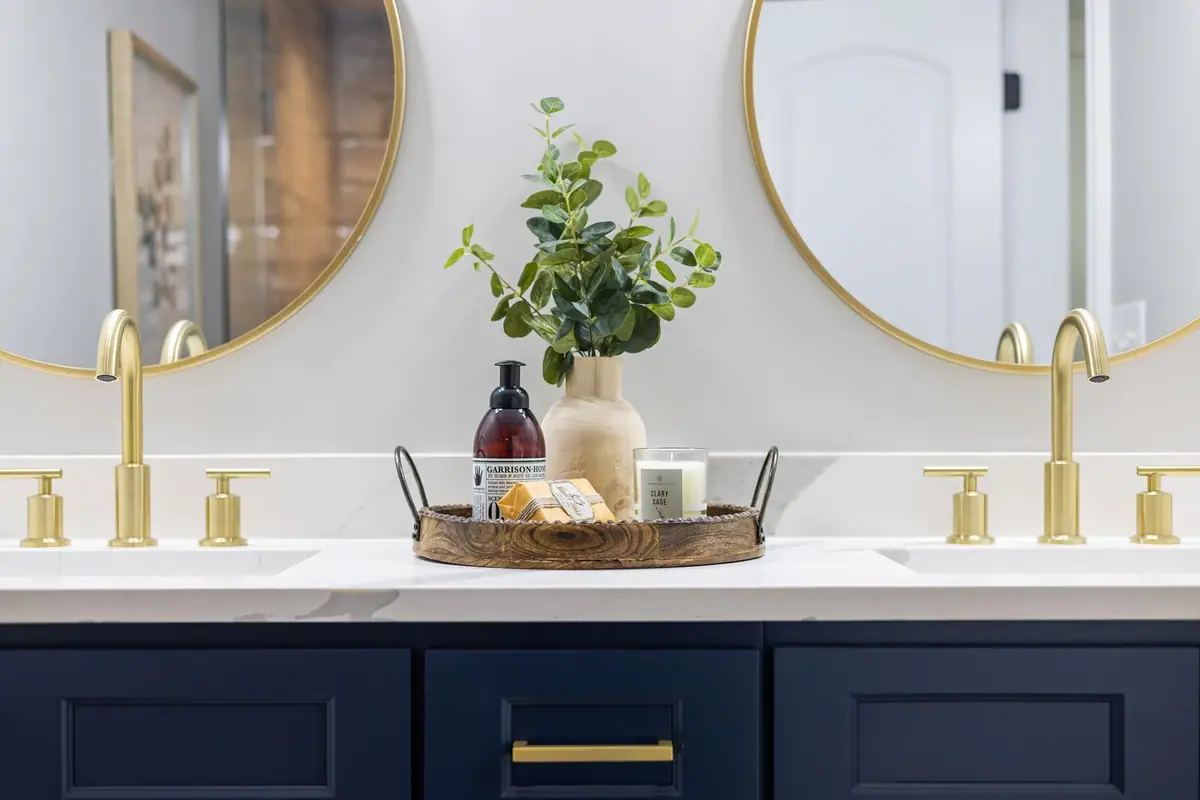 A bathroom vanity counter with grooming essentials