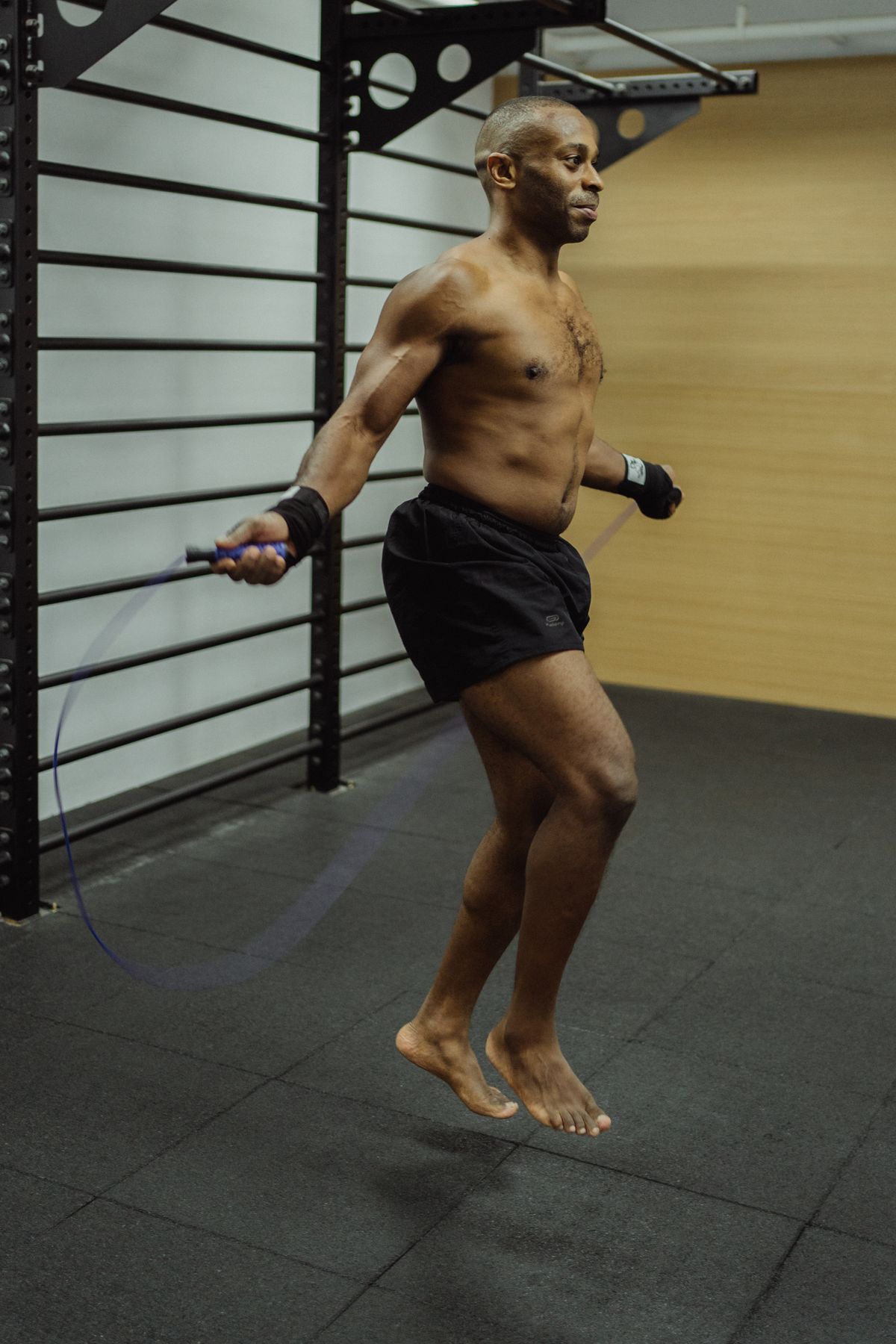 A man doing a jump rope workout