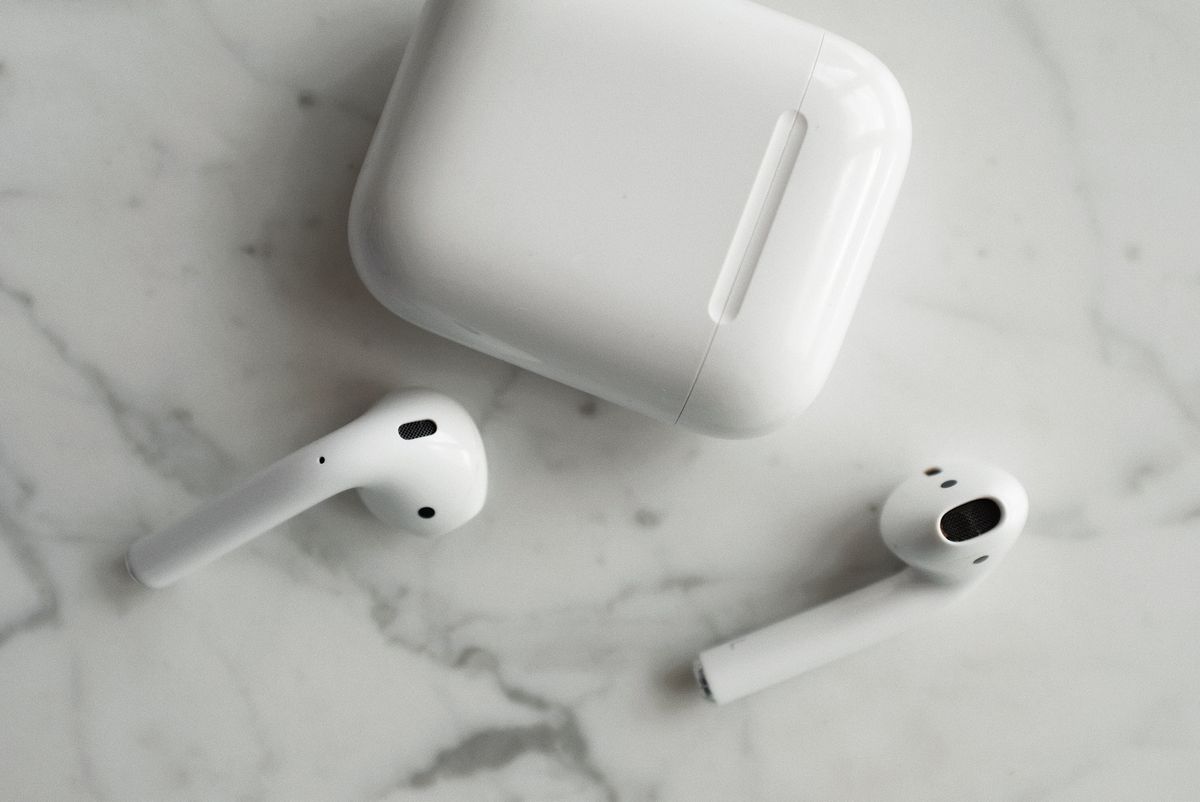 Wireless earbuds with their charging case
