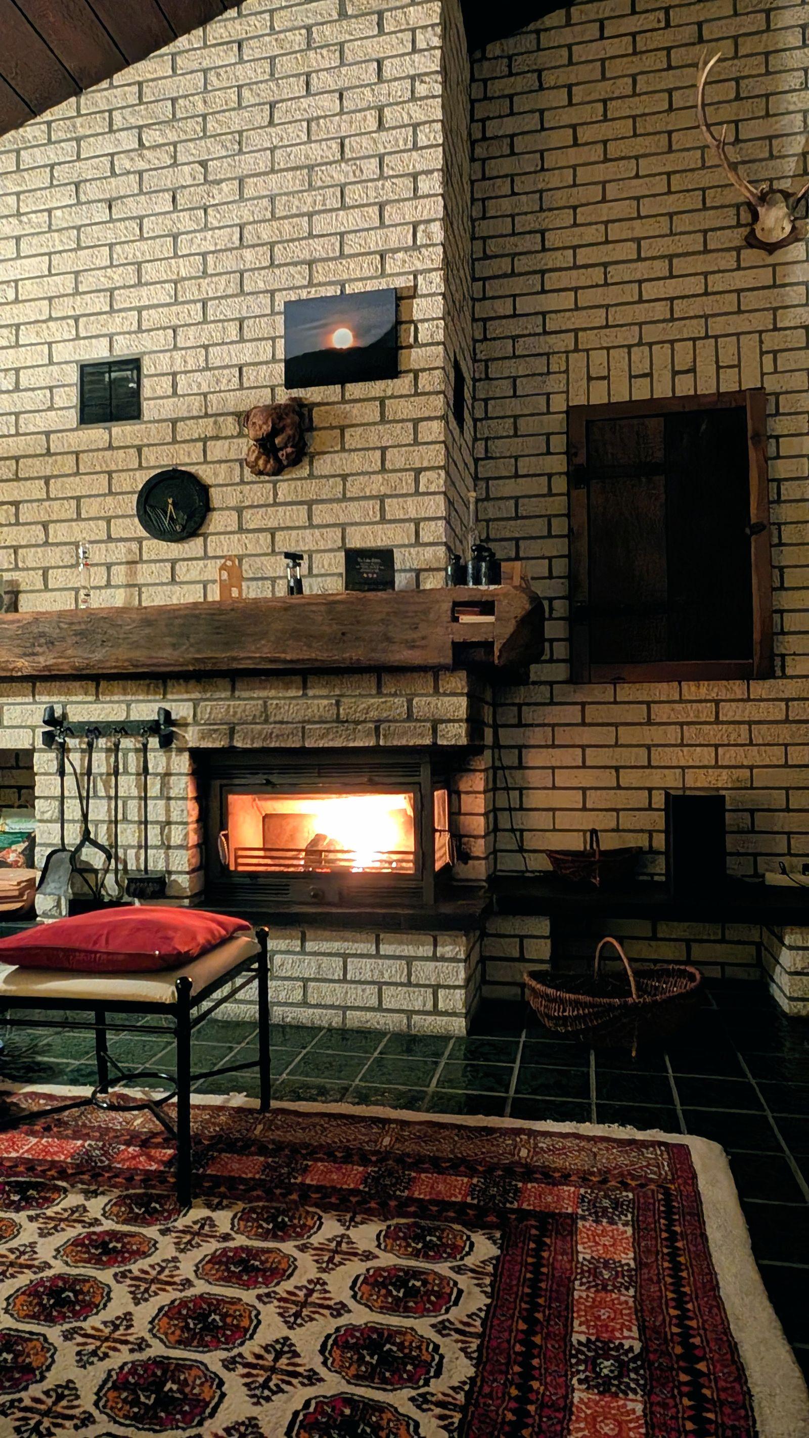 A cozy living room with a fireplace